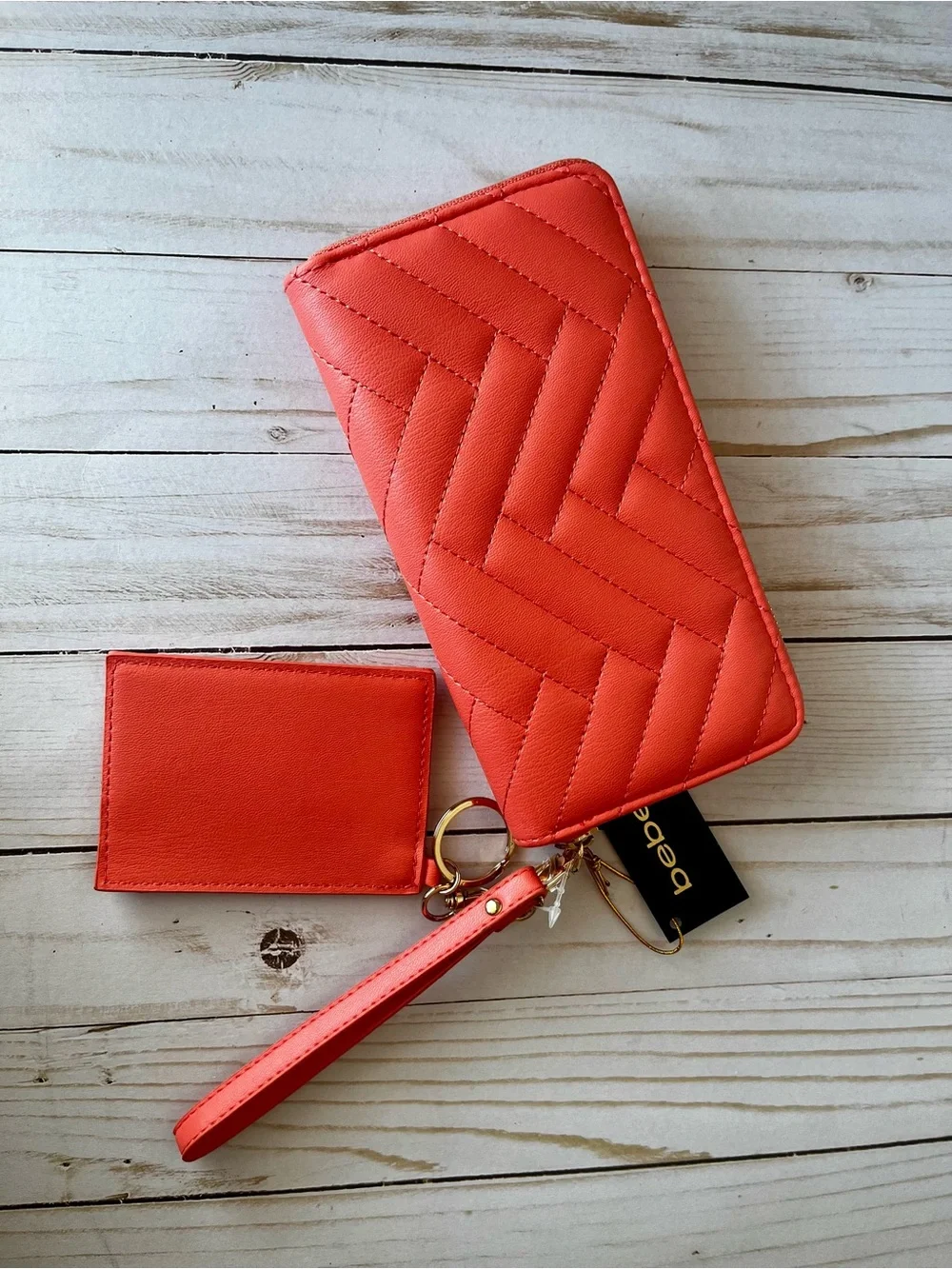 bebe Quilted Wristlet and Card Holder in Coral
